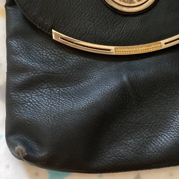 Black Michael Kors pocket book. Been used has been a good pocket book. - Picture 2 of 6